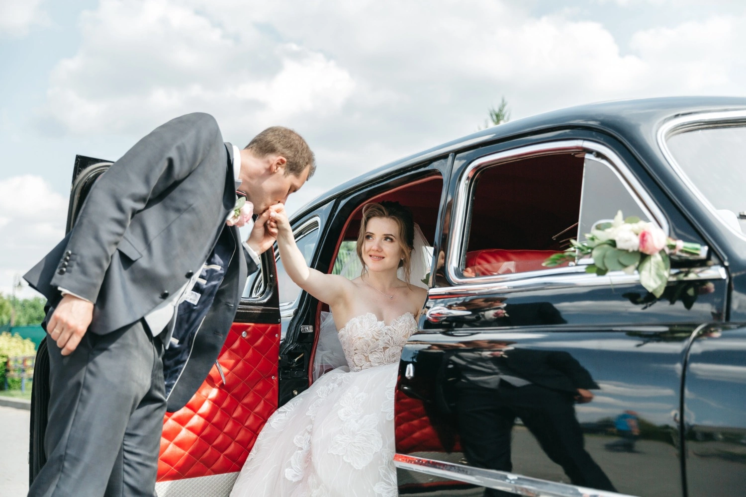 Bride with classic Bentley
